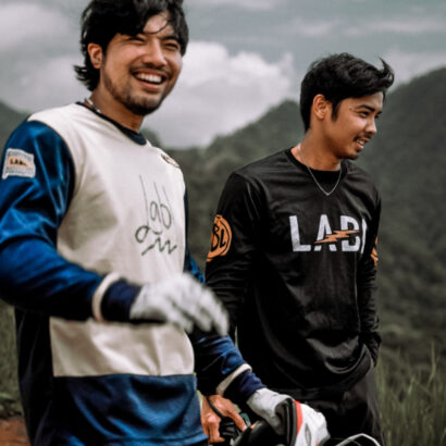Labl two riders smile